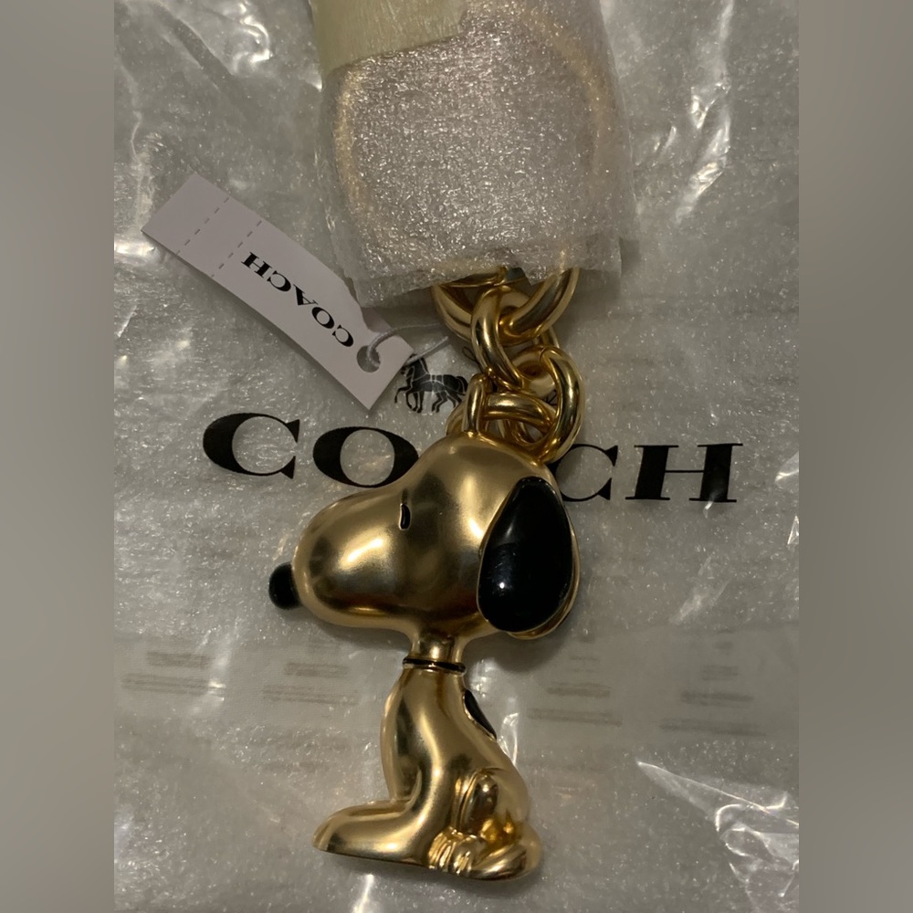 2022 NEVER Used Coach X Peanuts Snoopy Bag Charm GOLD MULTI